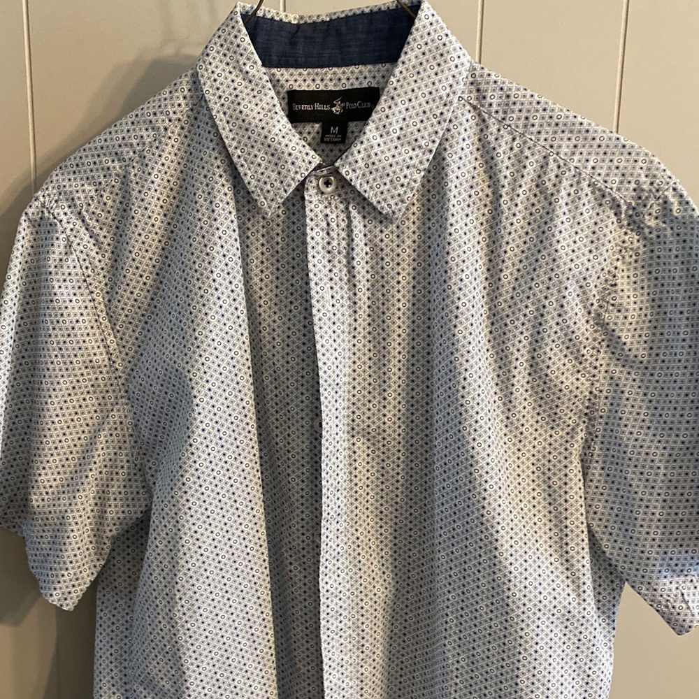 Dressy button up polo short-sleeve shirt.